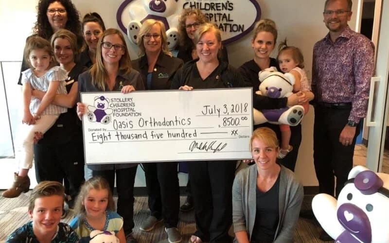 Oasis Orthodontics team presenting a donation cheque to the Stollery Children’s Hospital Foundation