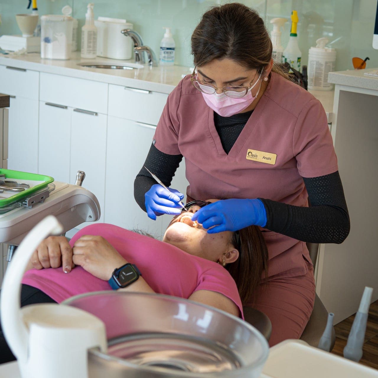 Orthodontic assistant caring for a patient at Oasis Orthodontics in Edmonton